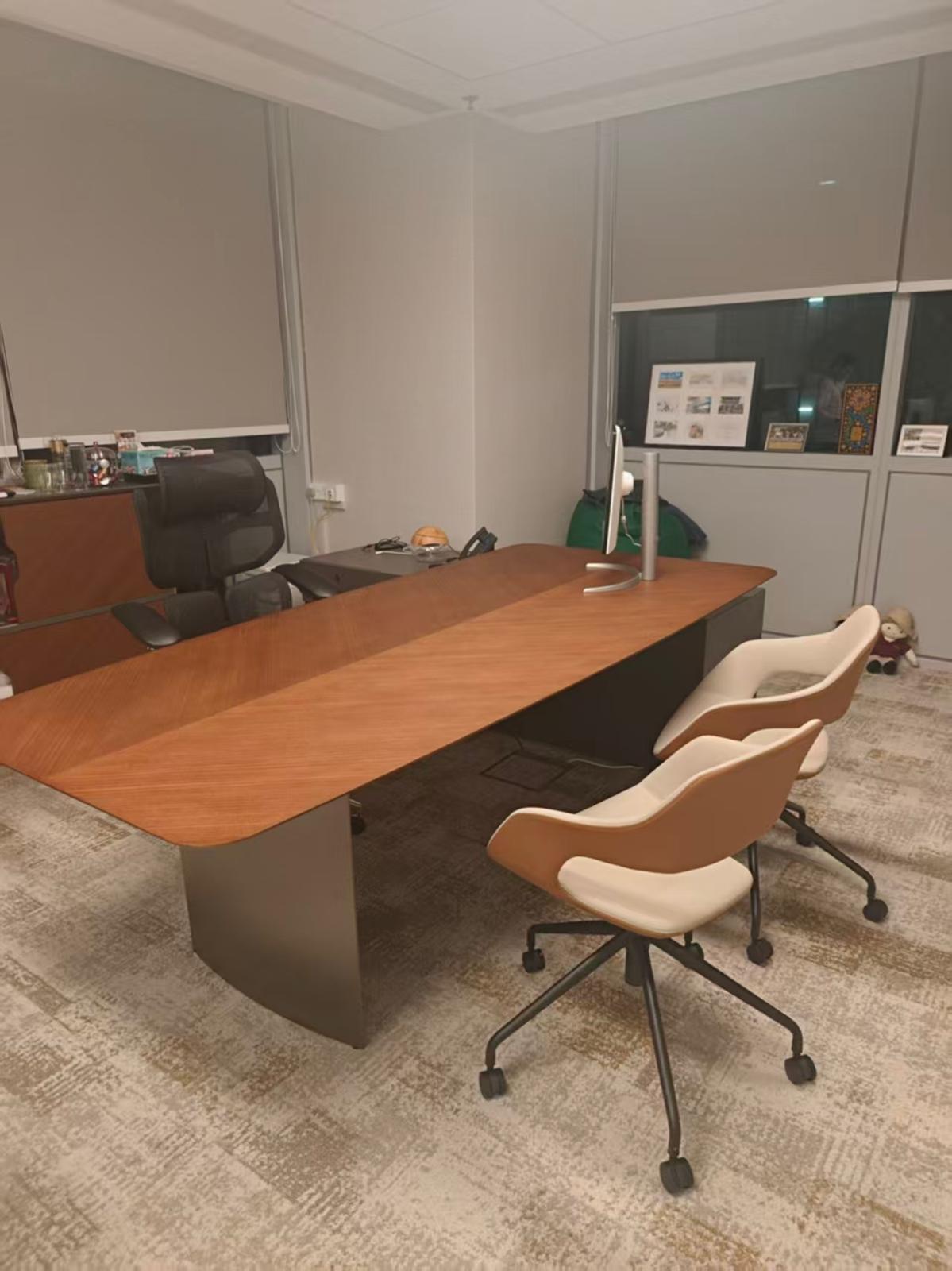 Large office meeting table with chairs assembled by The Good Guys Singapore.