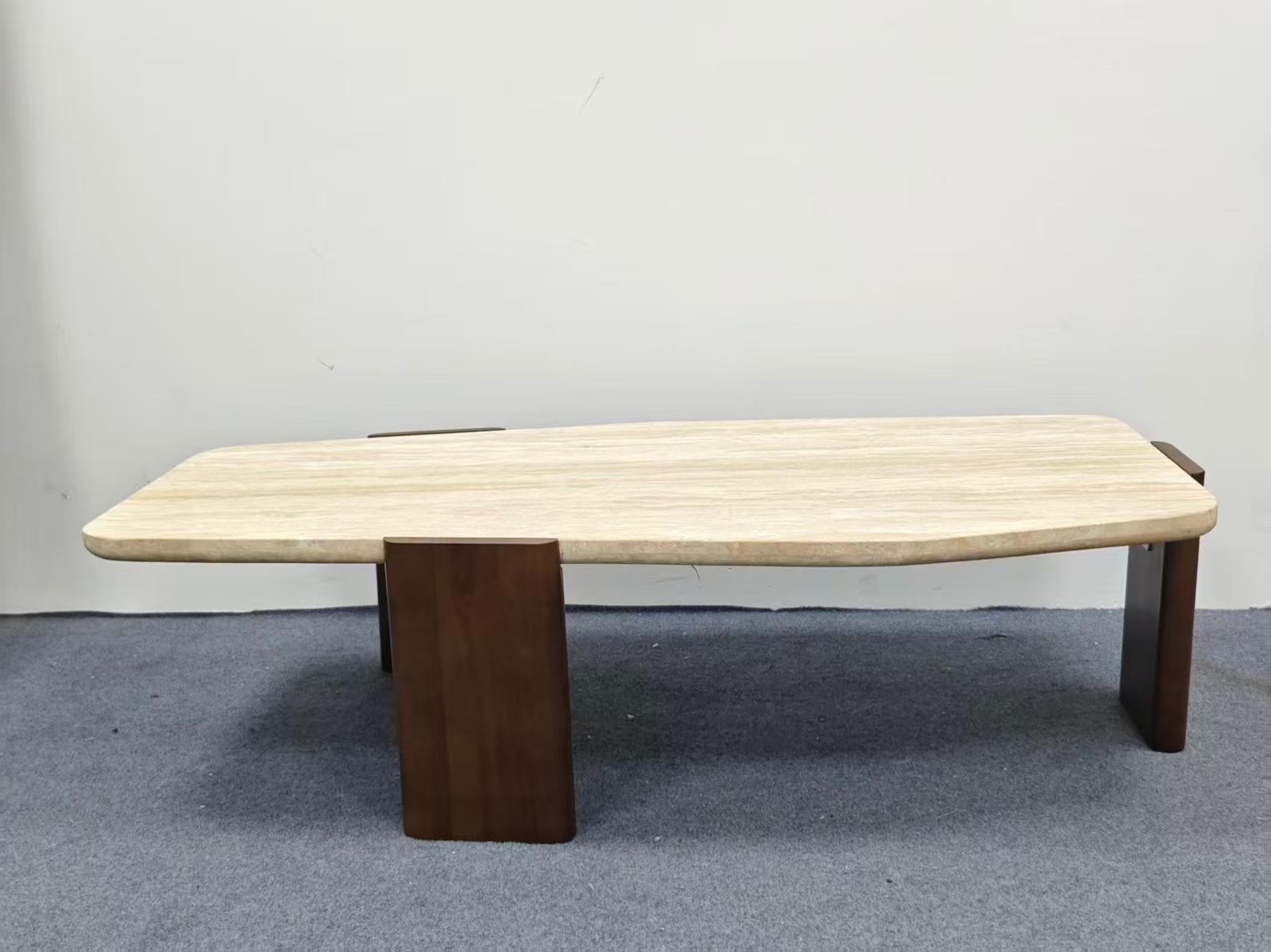 Long table with light wood-look top and dark panel legs assembled by The Good Guys Singapore.