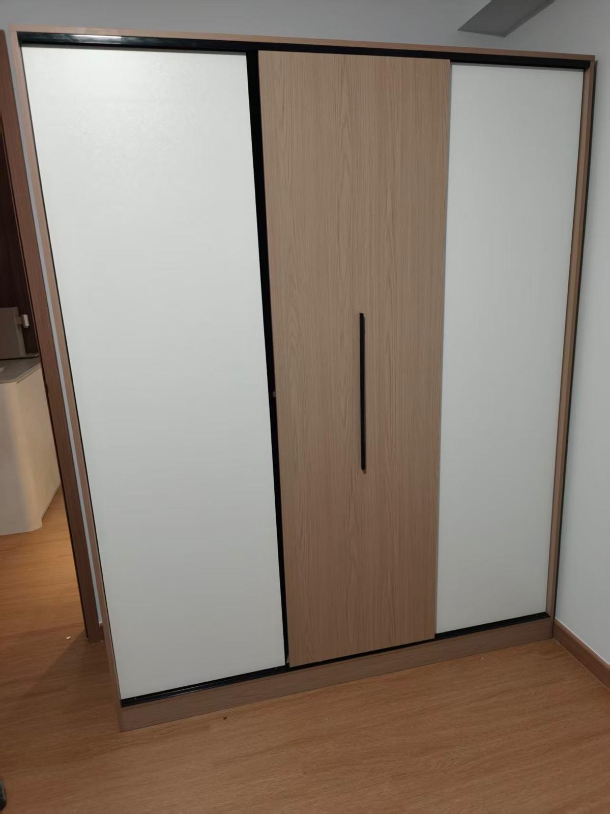 Sliding-door wardrobe assembled by The Good Guys in a Singapore home.