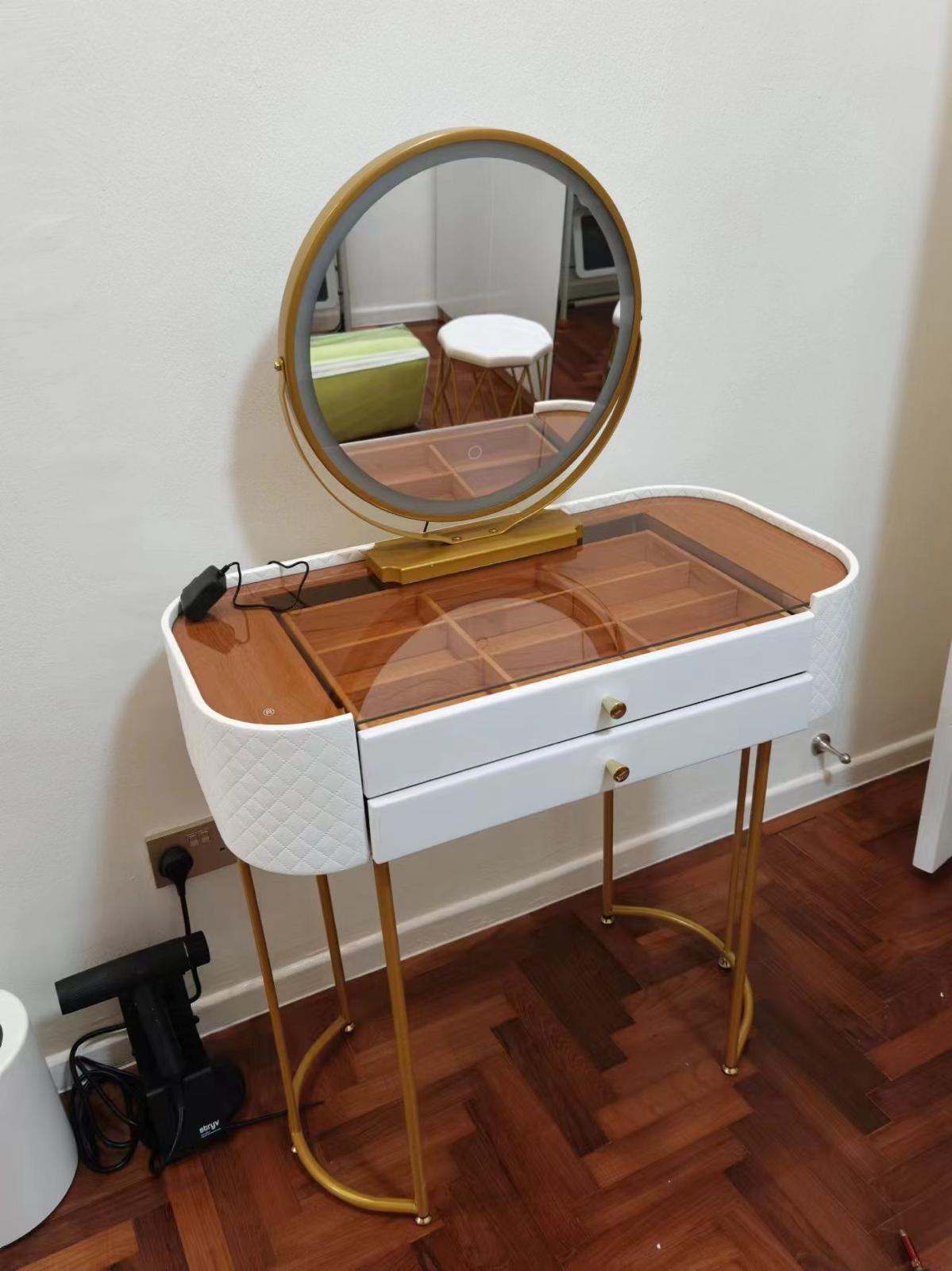 Dressing table with drawers and round mirror assembled by The Good Guys Singapore.