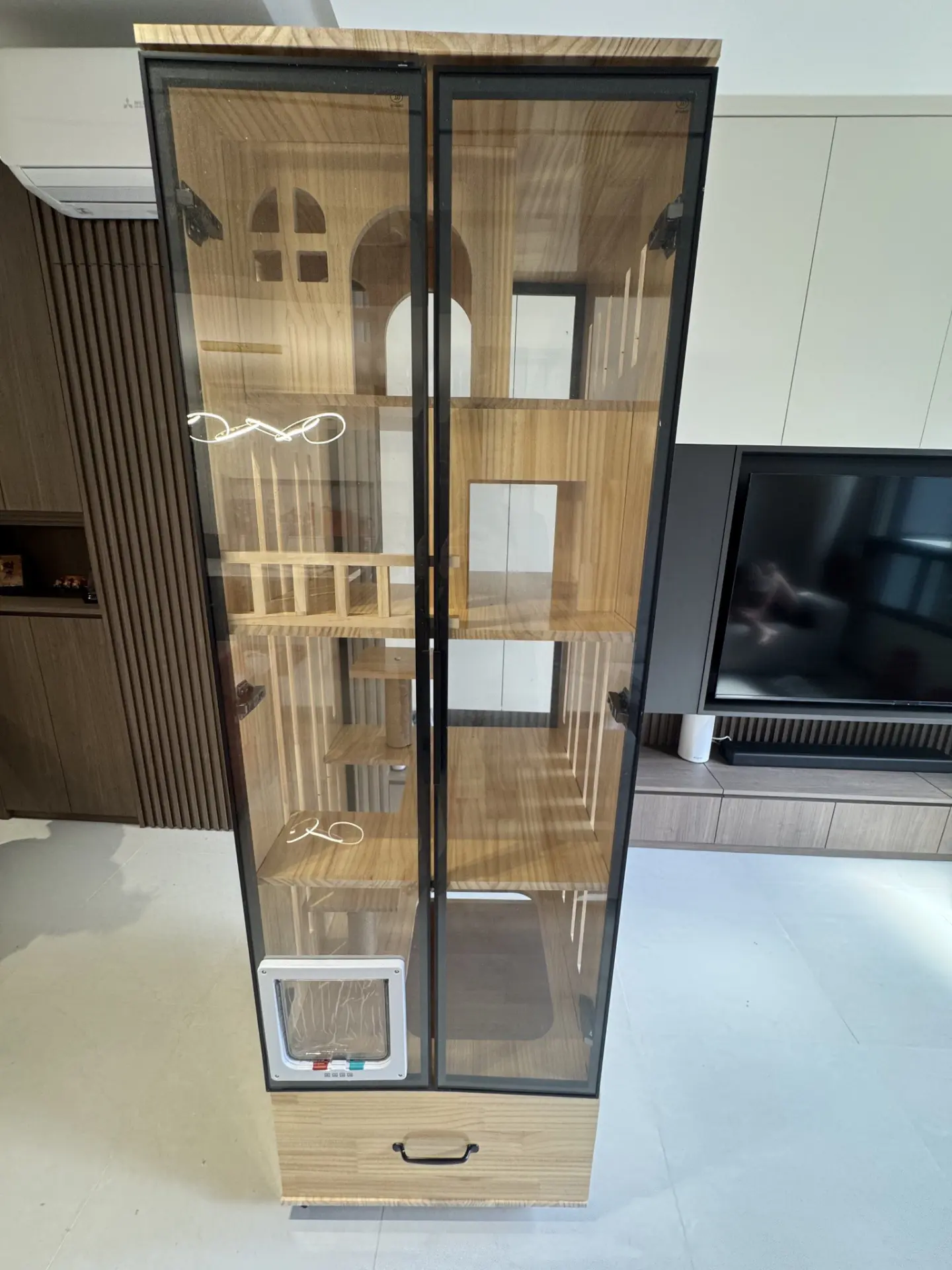 Custom enclosed cat villa and pet home assembled by The Good Guys Singapore.