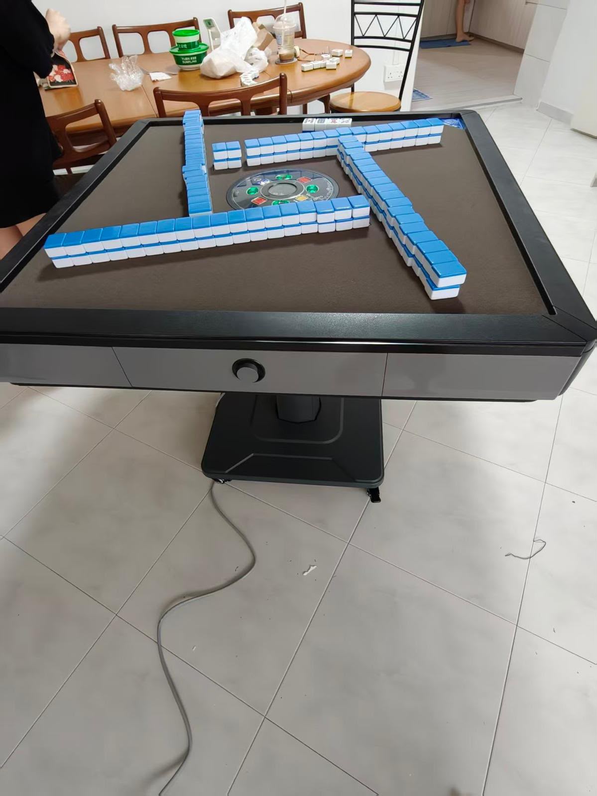 Automatic mahjong table assembled and set up by The Good Guys Singapore.