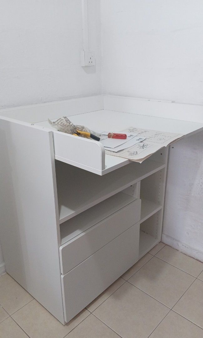 White IKEA study desk with drawers and storage assembled by The Good Guys Singapore.