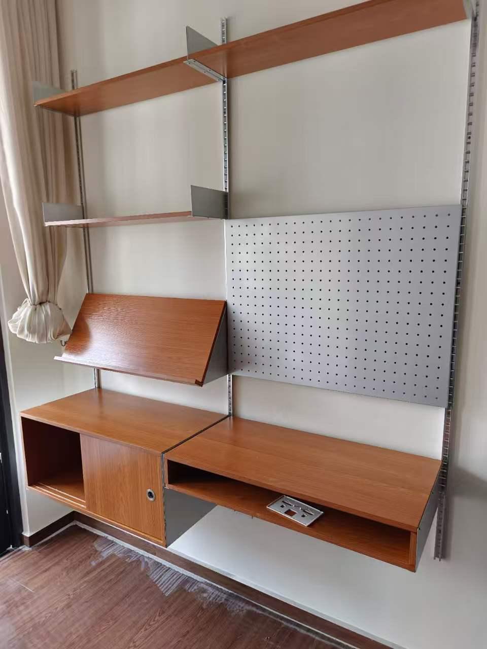 Wall-mounted shelving and desk system installed by The Good Guys Singapore.