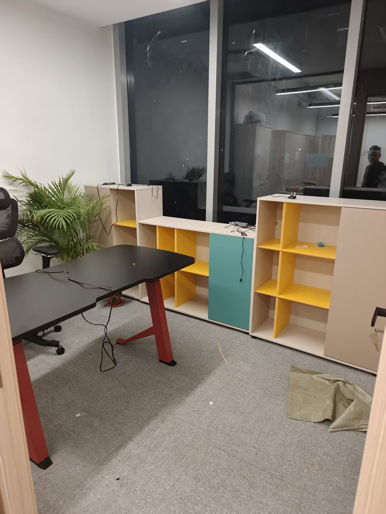 Office desk with open shelving and storage cabinets assembled by The Good Guys Singapore.